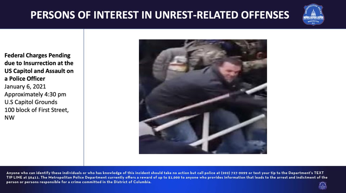 Here's a second individual identified by MPD as a person of interest in the assault of a police officer. He is clearly involved in pulling a Metropolitan Police officer down the steps at the west-side door incident in this screengrab.