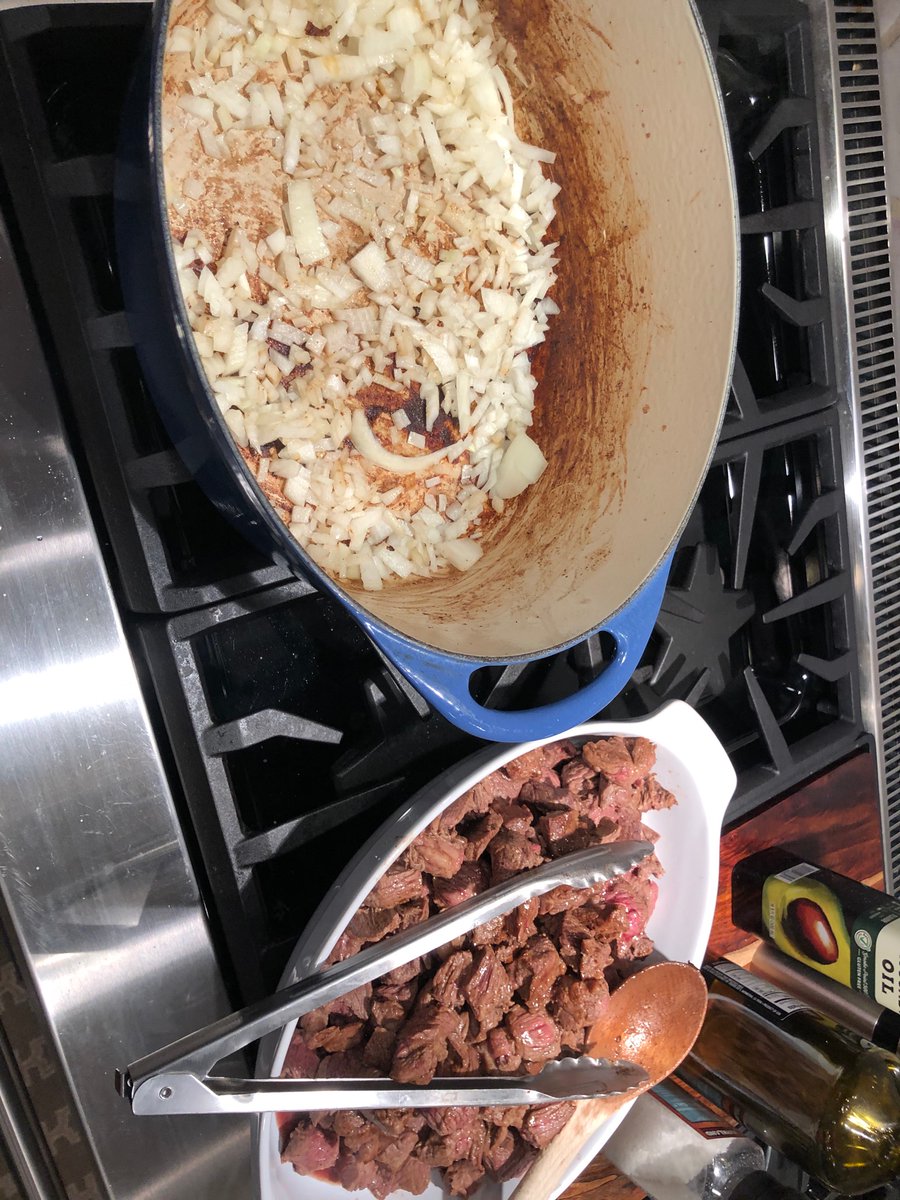 Using 6 lbs of round chuck roast, cubed. Should be trimmed better than this. Cook it in 3rds with veg oil, salt, pepper. Then cool 2 cups of yellow onion in salt and cumin.