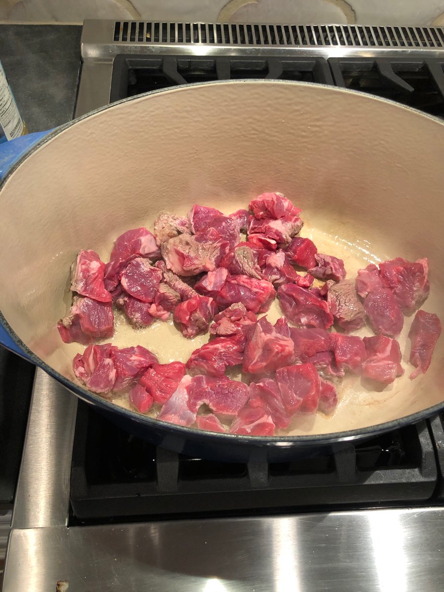 Using 6 lbs of round chuck roast, cubed. Should be trimmed better than this. Cook it in 3rds with veg oil, salt, pepper. Then cool 2 cups of yellow onion in salt and cumin.