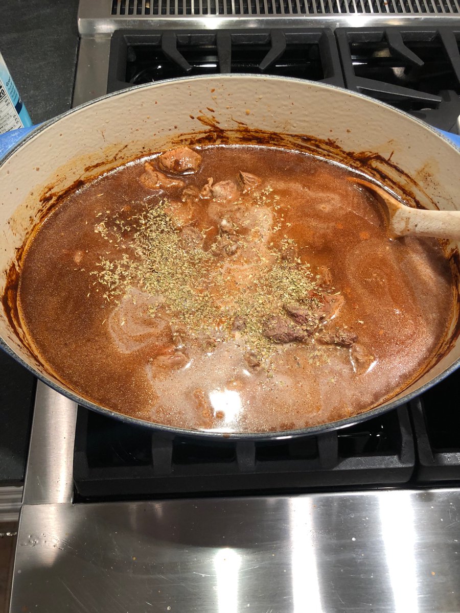 After 15 minutes of cooking and stirring, add beef, 6 cups of beef broth, and a couple of teaspoons of oregano. Also add 2 tablespoons of Masa Harina to thicken it.