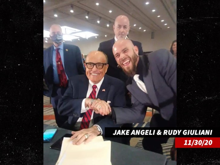 kdlovesmd's tweet photo. Did you think it wasn't planned ? Giuliani pictured here with " horn man "  look at the date https://t.co/rB8MGrwnju