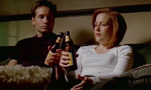 Mulder and Scully infamously drink Shiner Bock on Mulder's couch during "Je Souhaite" (S7E21), and the Texas-based beer brand also appears in Breaking Bad when Hank requests it - as well as in Better Call Saul in a shot mirroring the X-Files