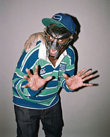 We always enjoy unexpected rugby shirt sighting, so imagine our delight at coming across this picture of the late, great MF DOOM wearing a RWC2011 fan jersey (with a lizard) - very cool.