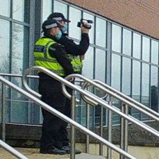 Here is a pic of the police officer from  @swpolice filming the peaceful protestors who are exercising their right to peaceful protest in line with the Human Rights Act. We have cropped and zoomed in, pic is from  @ckkhaira of  @ITVWales  #Justice4Mohamud #BlackLivesMatter   [19]