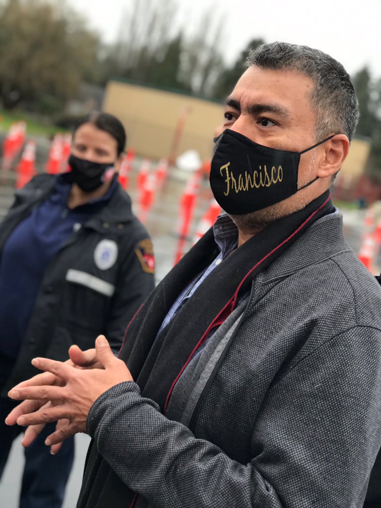 Partner wearing face mask that reads “Francisco” at South King County #COVID19 testing site.