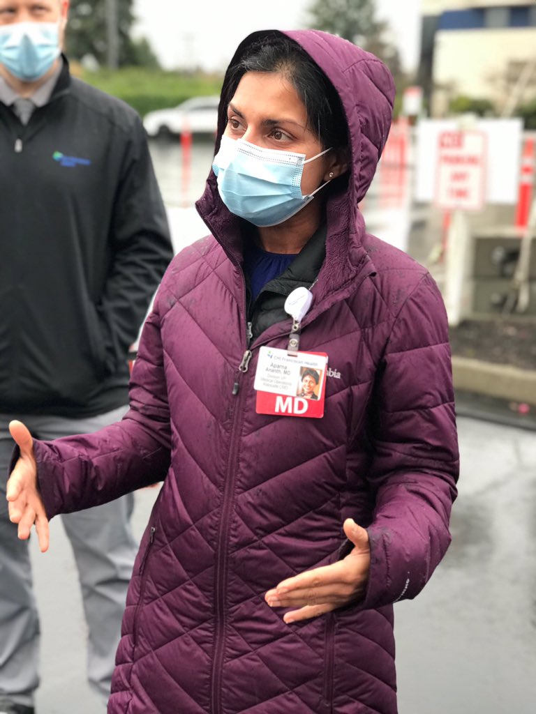 Medical doctor wearing face mask at South King County #COVID19 testing site explains the work they do daily.