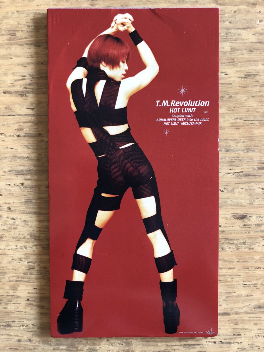 Nakamura8cm 全身像ジャケ8cm Hot Limit T M Revolution 1998年6月24日発売 作詞 井上秋緒 作編曲 浅倉大介 奇抜な衣装でボディラインを強調した西川貴教の後ろ姿全身像 短冊デザインのひとつの完成形 100点