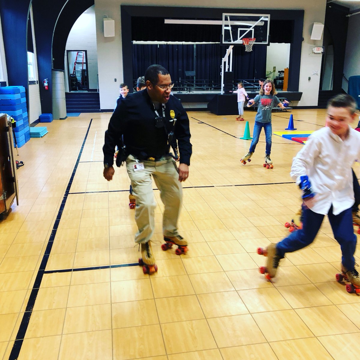 Shoutout to SRO Sal Peterson, seen here roller skating with elementary students in McCracken County (pre-COVID). We see you, SRO Peterson!
