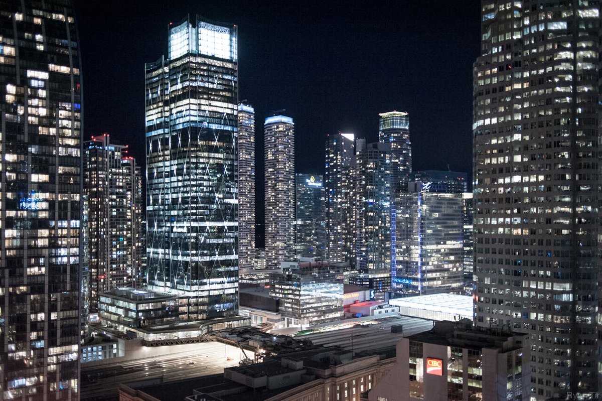 Urban_Toronto's tweet photo. An impressive illumination effect of the new CIBC SQUARE office complex at #Toronto's Bay and Lake Shore intersection is today's #DailyPhoto. https://t.co/lK59o9ijcd https://t.co/br8Sbpnmqa