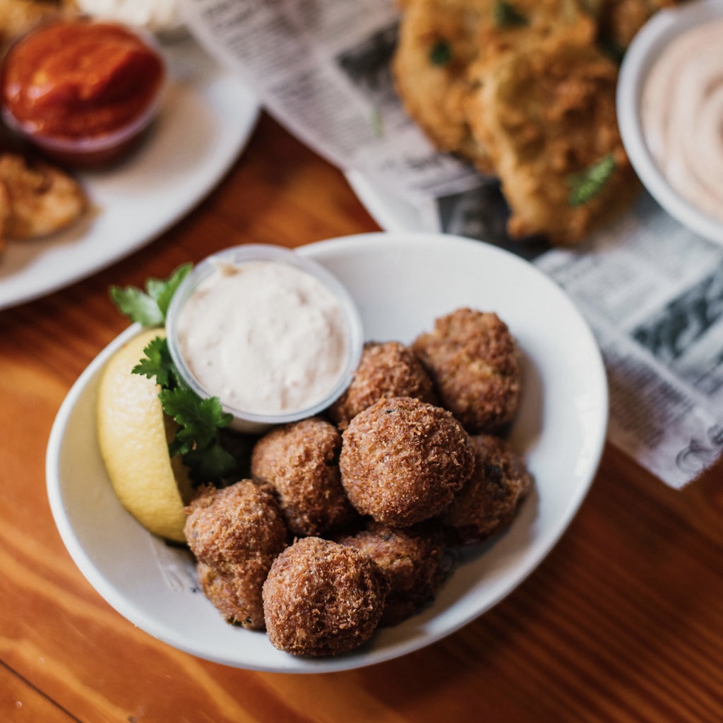 fiddlersriverst's tweet photo. Have you tried our crab bites yet? Pair them with a house salad and you have a delicious lunch or dinner! #deviledcrab #fiddlerscrabhouse #riverstreet https://t.co/D1pXgpYIMi