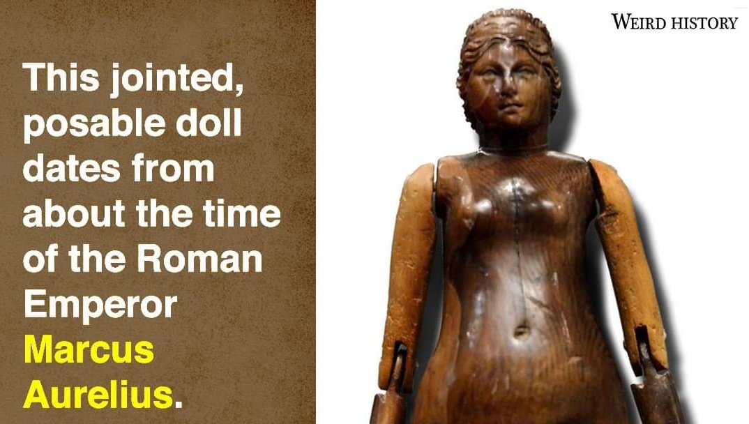 Second her skin color/The bust is made of yew wood, that's literally the color of the wood. It also darkens with age. For example, here's a Roman doll made of yew wood. It's also dark, doesn't mean romans were black, just the material's color.