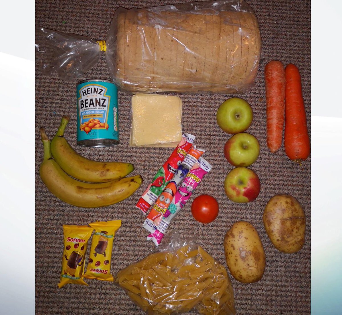 A loaf of bread, a bag of pasta, a can of baked beans, some cheese, 3 apples, 2 carrots, a tomato, 2 baked potatoes, 2 bananas, 2 malt loaf snacks & 3 snack size tubes of fromage frais! That’s it! A disgrace! £5 of food, while a #FSM company bag £30 from govt to provide it!
