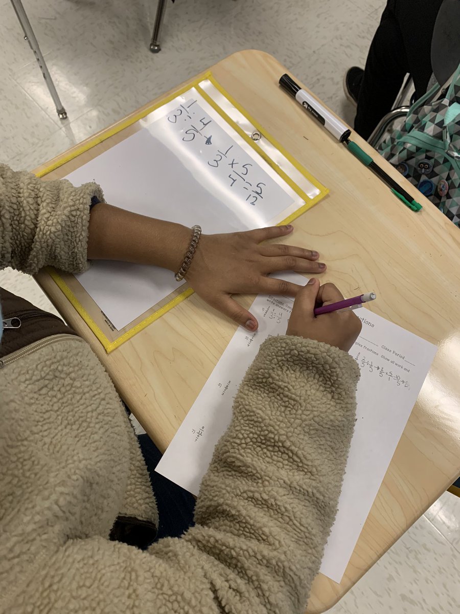 Thanks to <a href="/sloanscienceOMS/">Sasha Sloan</a> for joining in on our eighth period complex fractions practice! She proves to our kids all the time that you are never too “old” to learn new things. Thankful I get to work with you! ❤️💙⚡️ <a href="/OMS_Chargers/">Oakland Middle School</a> #weoverme #wallickswarriors #mathlife