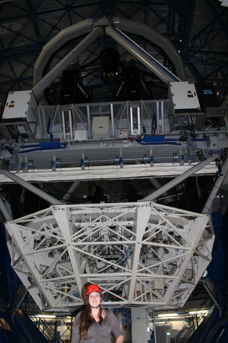 First of all we require huge telescopes to collect as many photons as possible. To give you a sense of size, below is  @ESO's 'Very Large Telescope' (VLT) which has a mirror diameter of 8.2m!