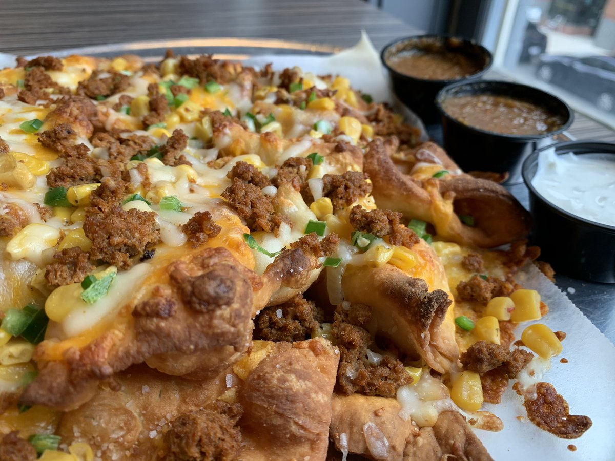 piepushers's tweet photo. pizza dough nachos - what?! optional add-one: local @ficklecreek chorizo, corn, & jalapeño. #welovechips #pizzadoughchips #ItalianNachos #meltycheese #greatfordipping #homemaderoastedsalsa #cilantrocrema https://t.co/s6NAVtbgX6