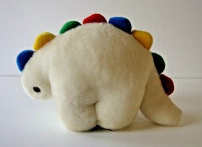 Vintage round stegosaurus plush