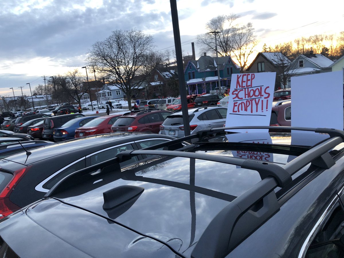 unionadvocate's tweet image. Educators in Saint Paul are about to begin a car rally in the school district office parking lot. @SPFE28 members, parents and health care workers will call on @SPPS_News to hold off on plans to reopen buildings until staff who work with students can access COVID vaccines