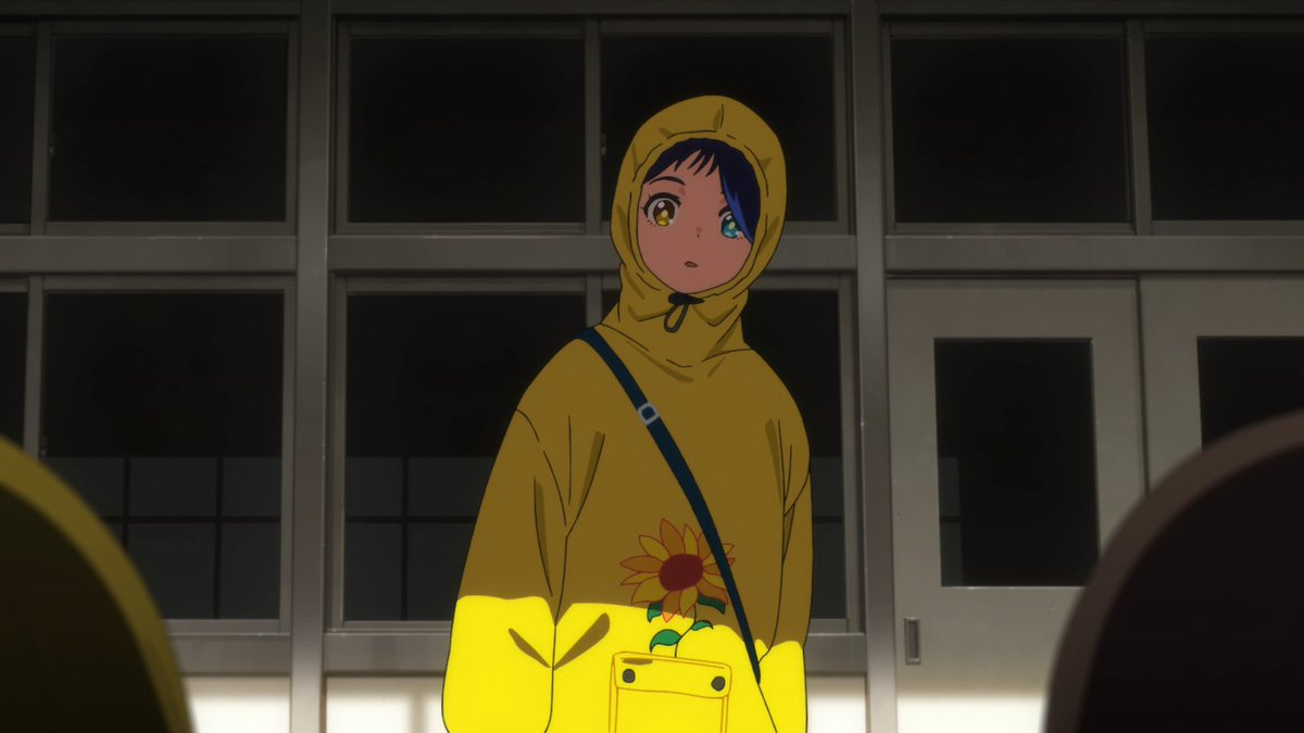 The flower here makes sense, it must be a flower on a desk which is typically placed there when a student dies which, as we learn later did indeed happen. Then there's the bullying that's seen and mentioned which even further implicates that bullying caused the death to happen.