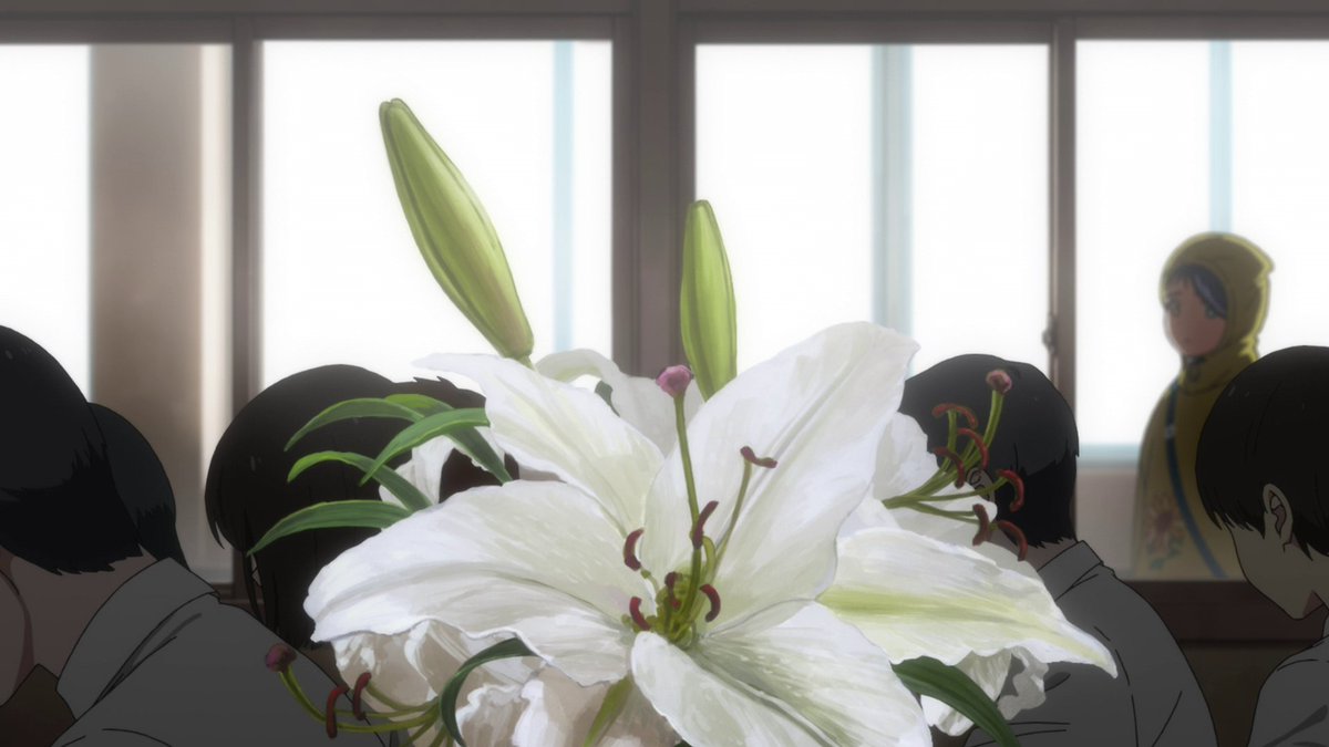 The flower here makes sense, it must be a flower on a desk which is typically placed there when a student dies which, as we learn later did indeed happen. Then there's the bullying that's seen and mentioned which even further implicates that bullying caused the death to happen.