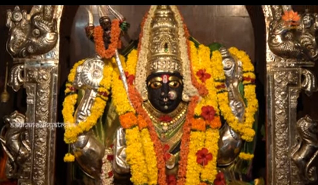 A better photo where you can see the Shankh and Chakra as well, along with the Trishul. As a result, she is worshipped as a triple incarnation of Maha Kali, Maha Lakshmi and Maha Gayatri in this temple.