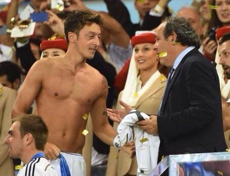 After the game UEFA President Michel Platini asked Özil for his shirt."I don't take the shirt from many players, but I'd love to have yours. It would be an honour."Özil donated his World Cup victory bonus to pay 23 Brazilian children's life changing surgerys.