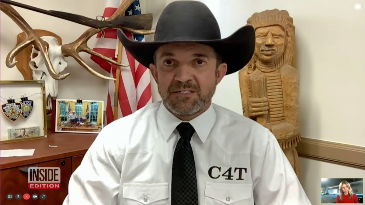 "We're not going to allow it. There will never be a Biden presidency," Republican county official Couy Griffin, who was at the U.S. Capitol for the January 6 riot, tells Inside Edition in front of wooden Indian and photo with Donald Trump.  @InsideEdition