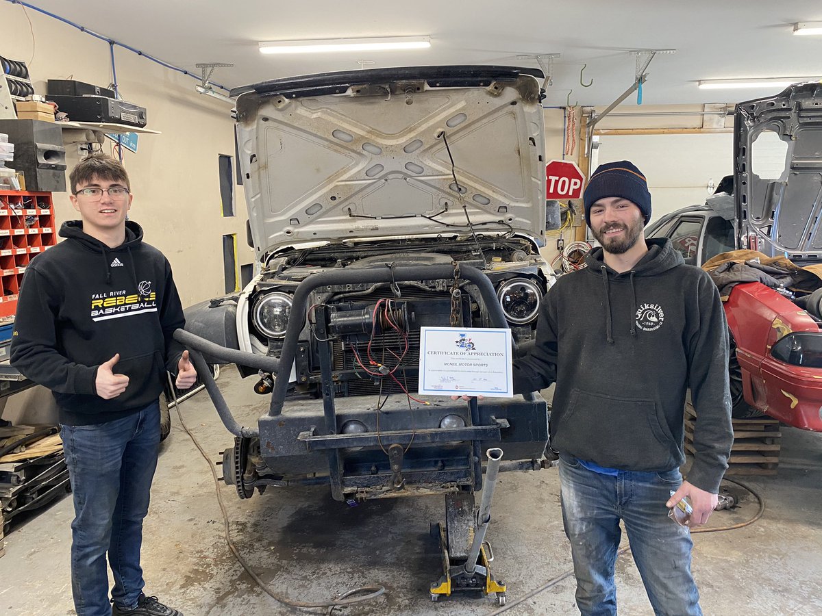 John_E_MacLean's tweet photo. Visited @lockviewhigh co-op student, Jacob as he completed his placement with McNeil Motor Sports. Him & his mentor Brandon took a break to show me the paint job, winch, and front-end brakes they were working on today. #FutureMechanic https://t.co/6Em6wvEUjV
