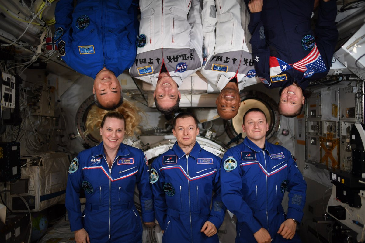 With 7 people on board, it’s hard to find space for a crew portrait…fortunately microgravity helps
