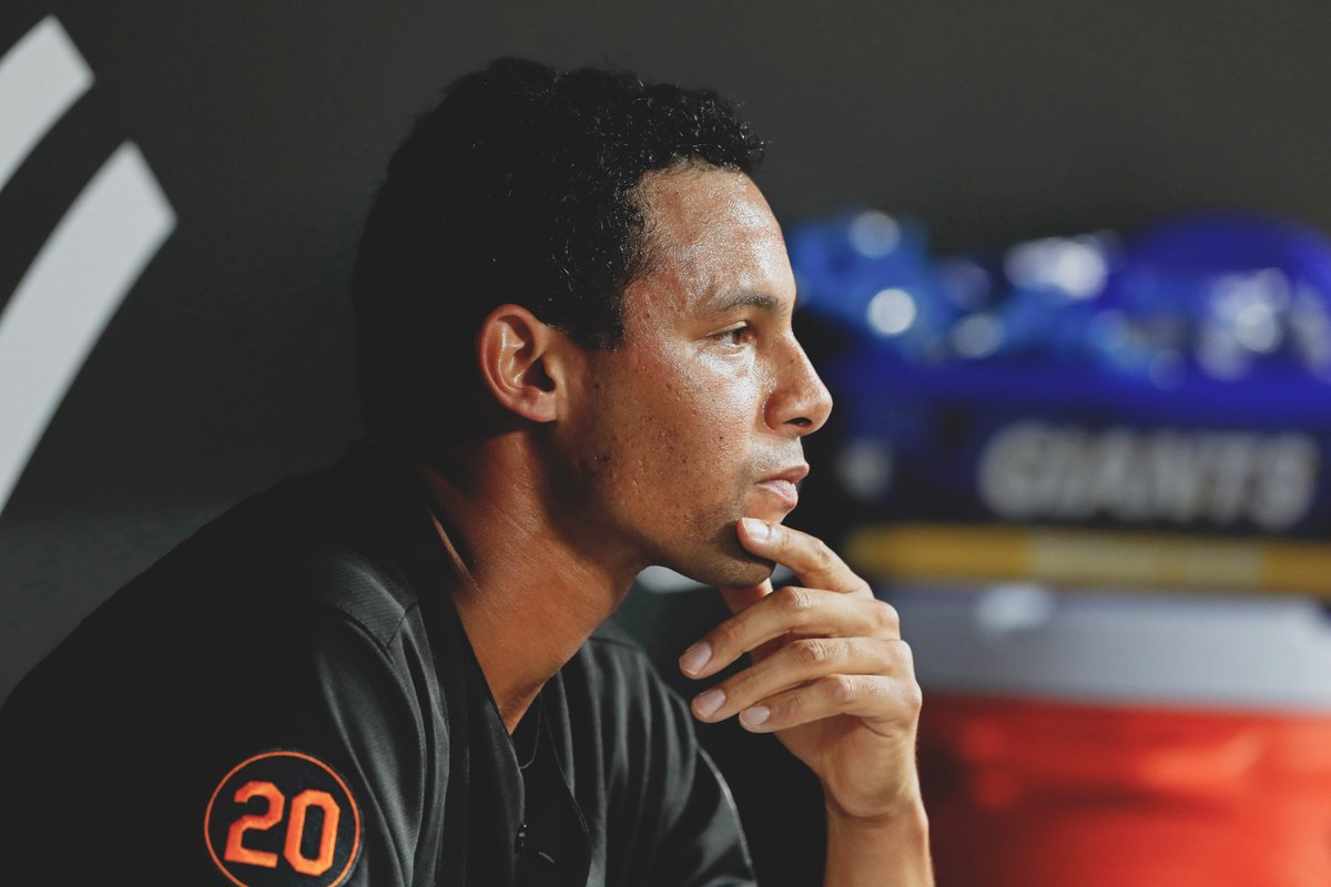 Branden Kline sitting pensively in dugout