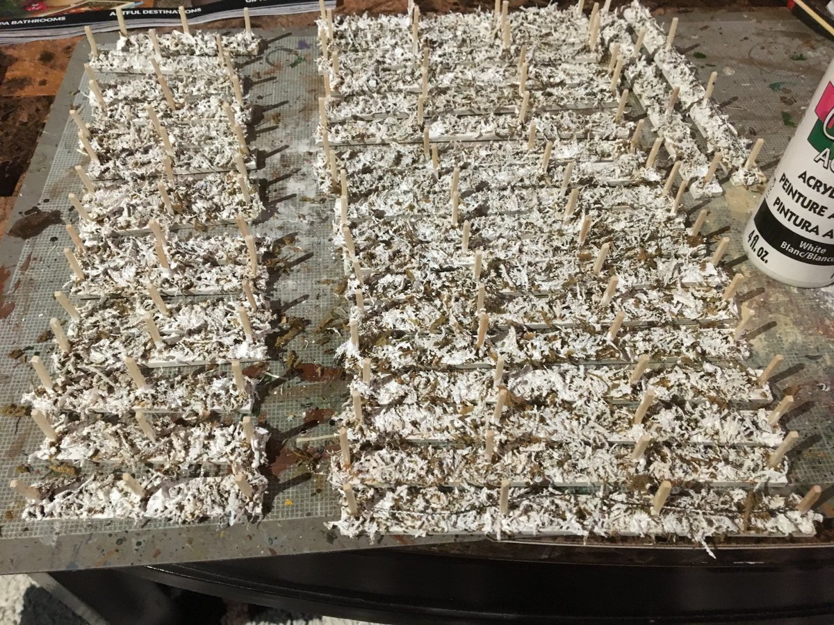 Here's where I went a little nuts. A friend cut 1/8 plywood on his laser cutter, I drilled holes for the matchsticks 6" and 3" sections. I drilled out the matchsticks to thread the barbed wire through. Painted them white, I built 13' of these, 114 matchsticks drilled twice. Crazy