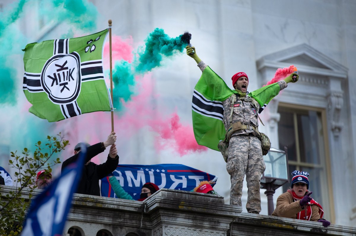There were also people from the alt-right there. Some wore Pepe the Frog masks. Others carried flags of 'Kekistan,' a fictional country that’s used to troll liberals. The design is partly derived from the Reichkriegsflagge, a war flag of Nazi Germany.