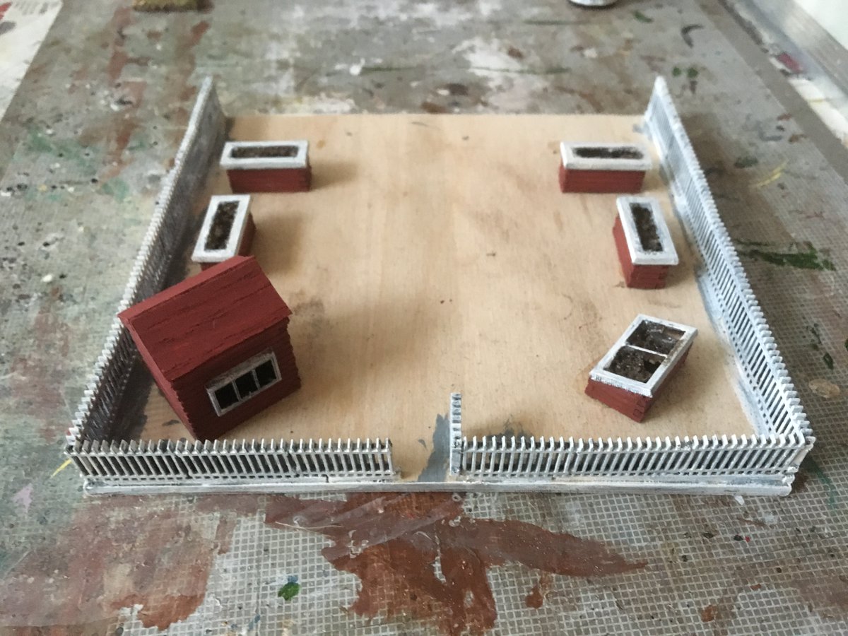 1st photo, I bought these from Scenic Route Models painted white and added SSN. It's a back yard for an existing house. 2nd photo scratch built fence using coffee stir stick and matchsticks, again added SSF.