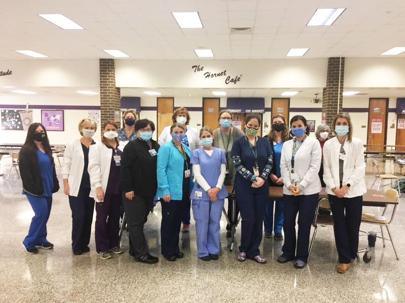 cpschoolsva's tweet photo. With the help of the @ChesHealthDept, the Virginia Medical Reserve Corps, and our dedicated Health Services staff, we were excited to offer the #COVID19Vaccine to our first group of employees today @DCHHornets! Thank you to everyone who supported this effort. #InspireCPS https://t.co/fIgTzQEYLC