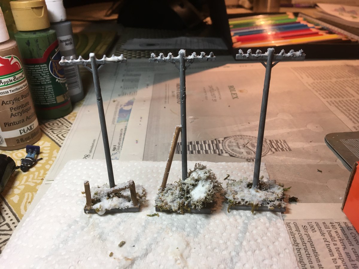 I had bought telephone poles at our local con for $5 a big bag full. Based, added some features and SSF. The Haystacks are lids of spray cans painted dark yellow/brown, then glued cut off sections of floor mat, based and SSF.