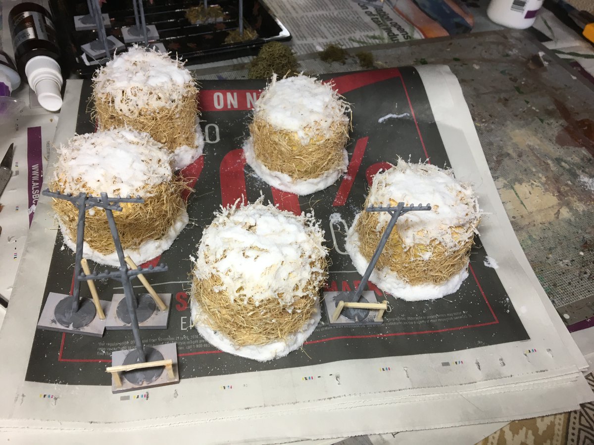 I had bought telephone poles at our local con for $5 a big bag full. Based, added some features and SSF. The Haystacks are lids of spray cans painted dark yellow/brown, then glued cut off sections of floor mat, based and SSF.