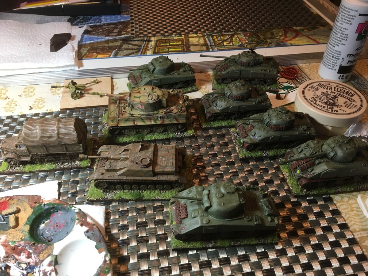 I had vehicles already painted for summer. I gave them all a white wash. I used Vallejo's white wash with extra white paint as needed.