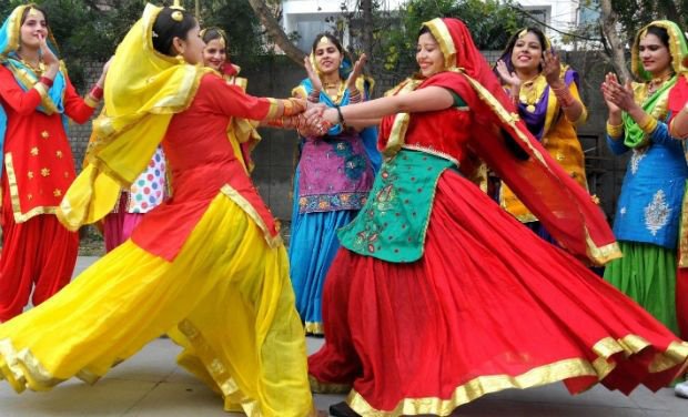 Lohri in  #Punjab Lohri is an extremely popular festival celebrated by the Punjabi people. Traditionally associated with the harvest of the rabi crop, people celebrate Lohri with feasting, exchange of gifts, and songs and dance around bonfires. Women perform 'kikli'.