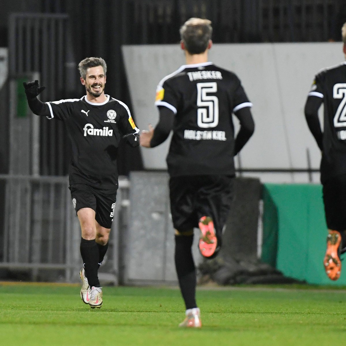 sportbible's tweet photo. Bundesliga 2 side Holstein Kiel have knocked Bayern Munich out of the German Cup. Incredible scenes! https://t.co/eQlhbrZGj5