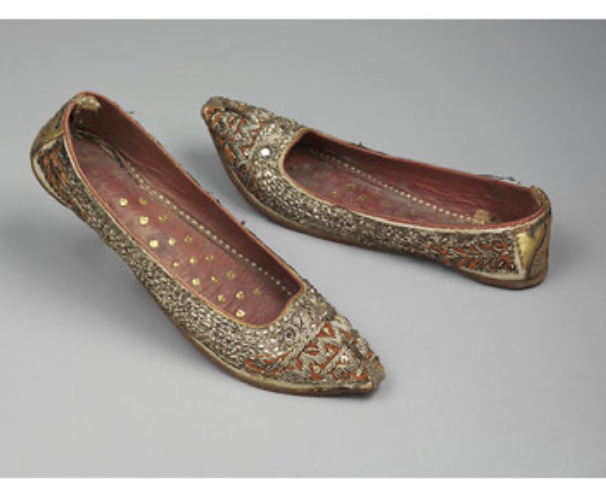 Sandals and shoes were woven with gold and silver thread. Sandals below have gold wire around edge. Shoes have gold points inside sole.