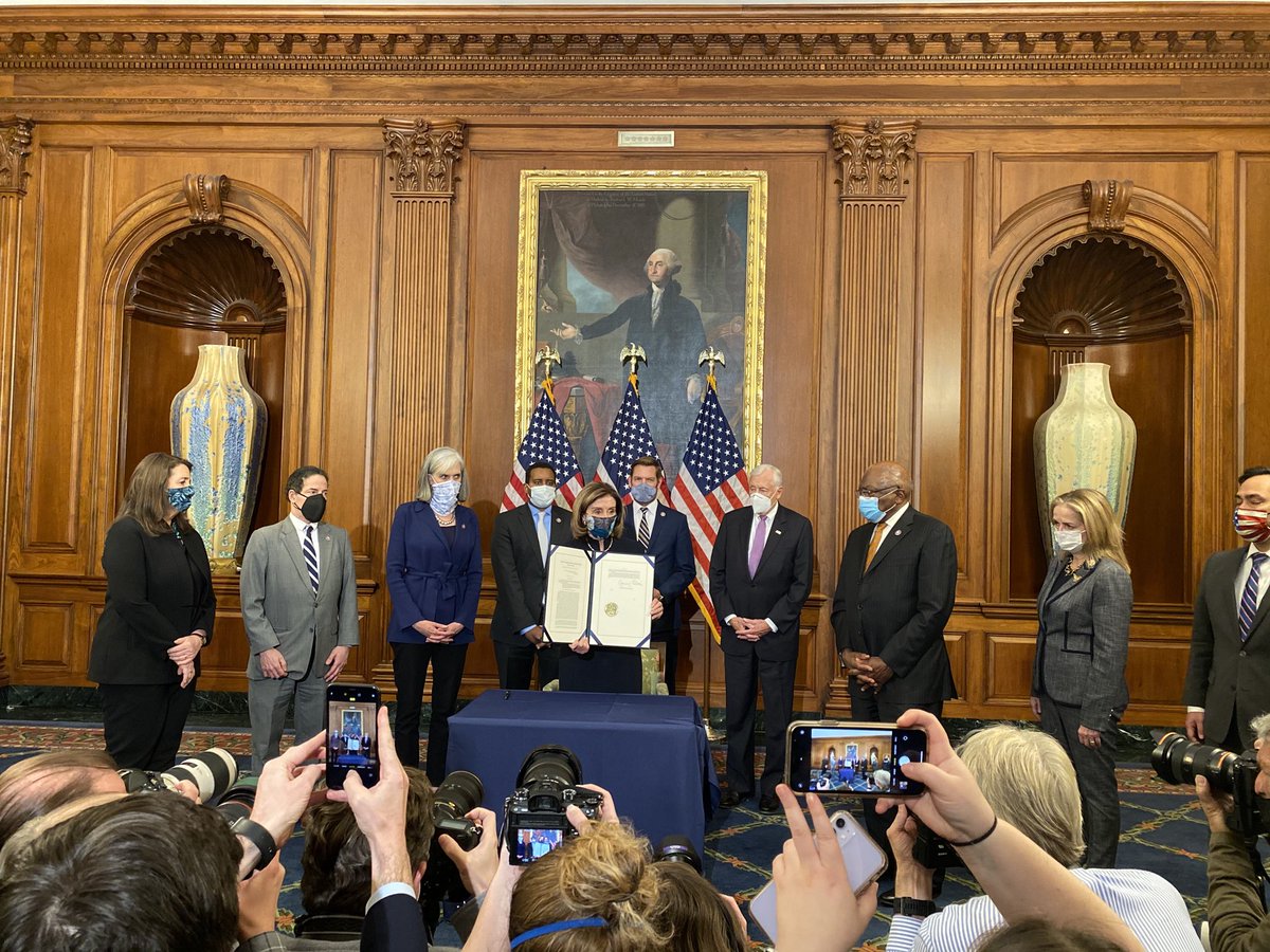 Pelosi officially signs the article of impeachment. She leaves without taking questions.
