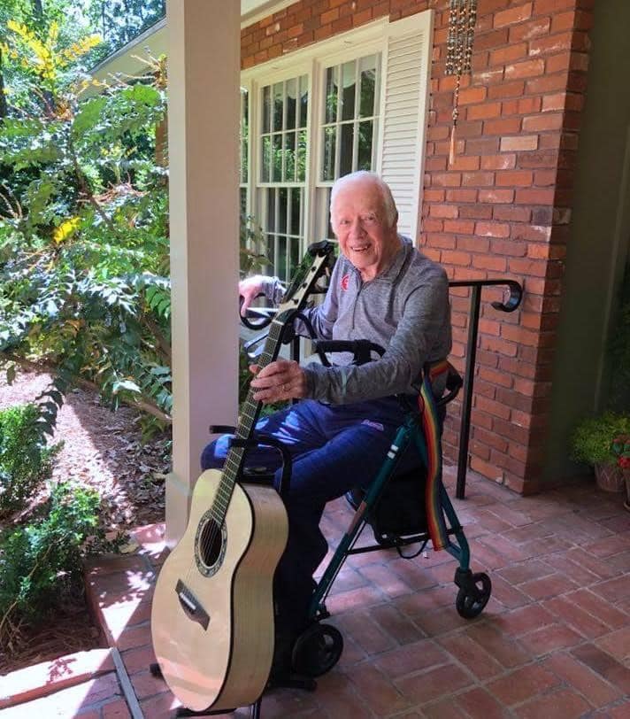 Jimmy Carter with a guitar he had made from a tree he planted.
 Let
 that sink in.
