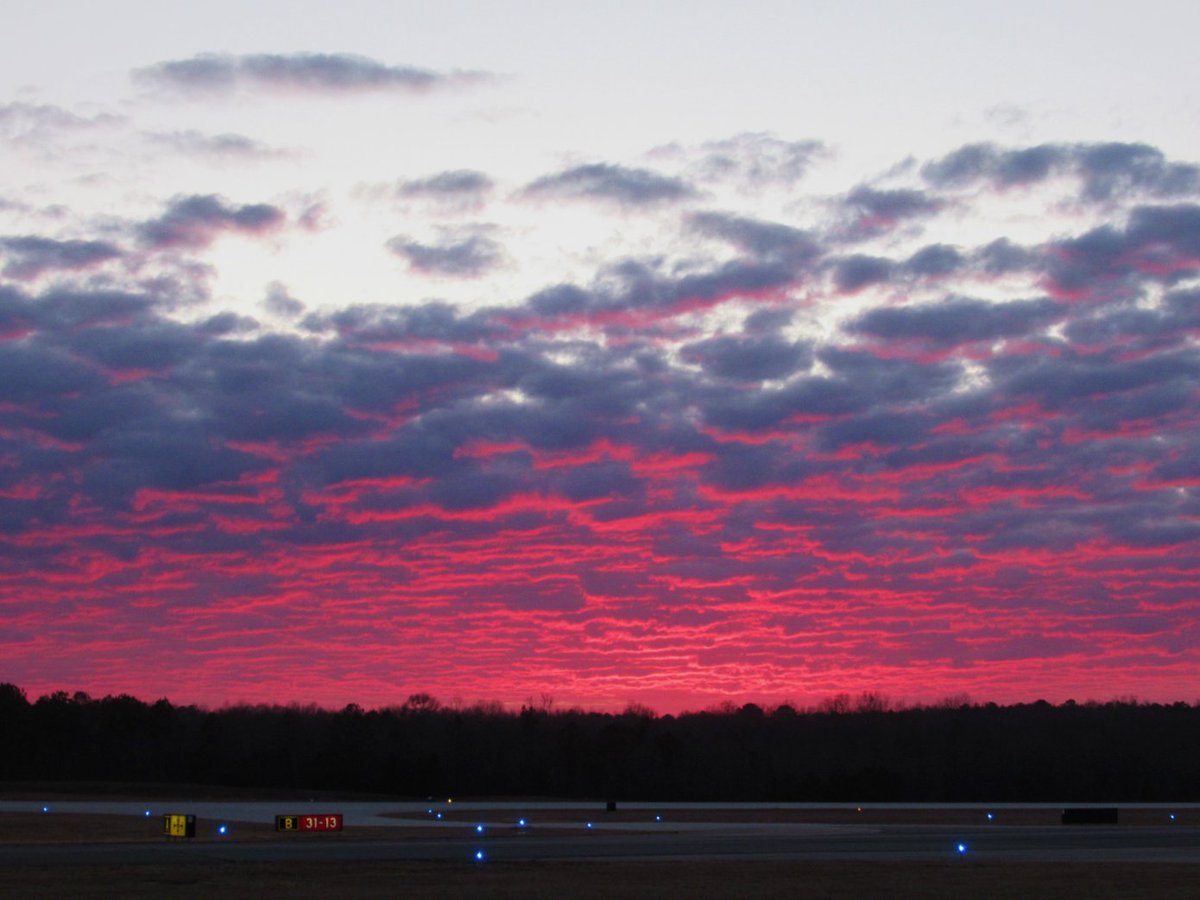NWSAtlanta's tweet photo. Impressive sunset through the stratocumulus clouds at Falcon Field this evening, just before the weather balloon release. #gawx #luckytiming https://t.co/ejmLBfUJdT