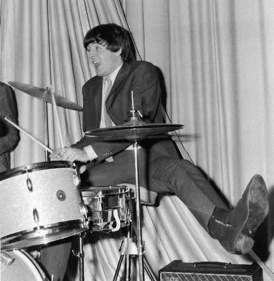 paul mccartney the usurper being dragged off the drumkit by a phantom ringo