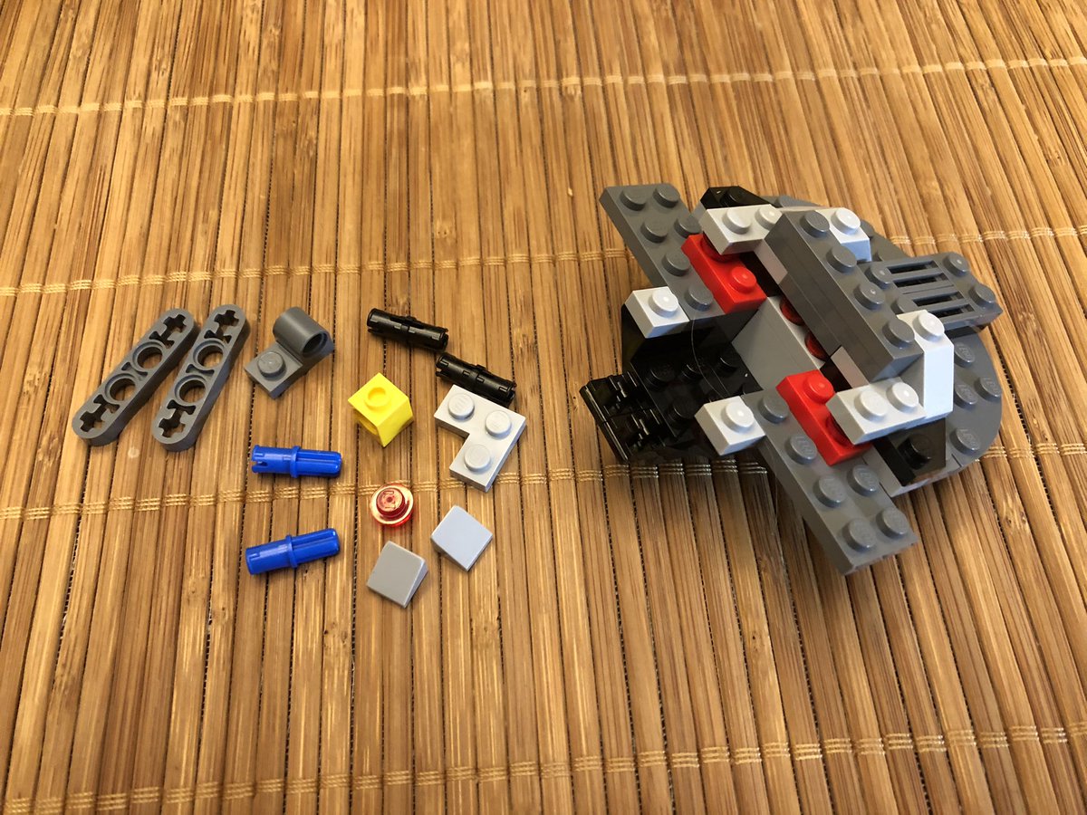 These pieces make a little gizmo that attaches in the back. Then we put the cockpit walls in.  #LEGO  