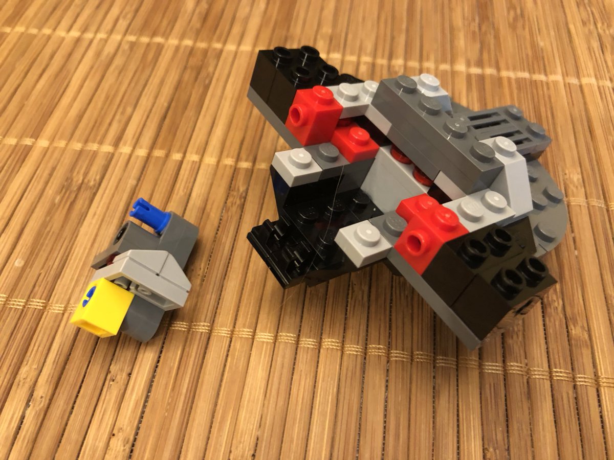 These pieces make a little gizmo that attaches in the back. Then we put the cockpit walls in.  #LEGO  