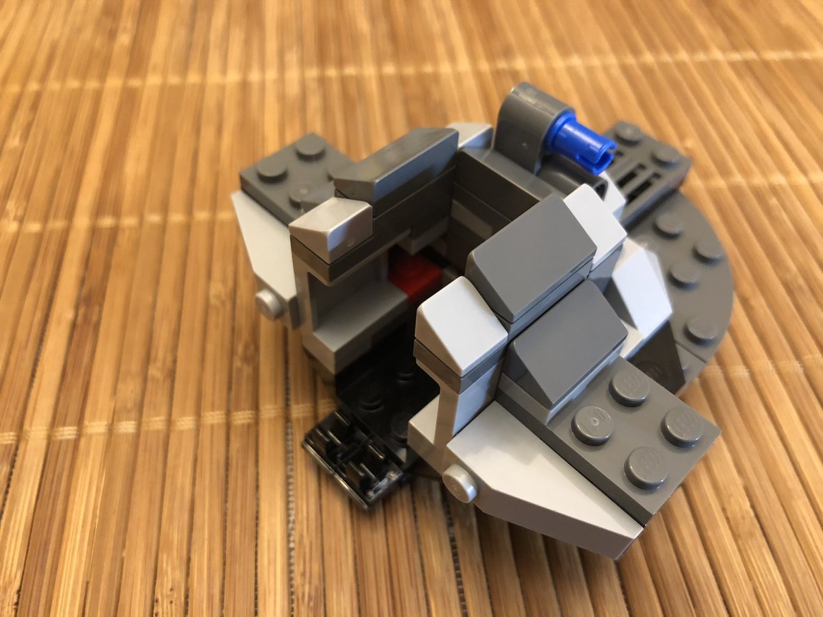 A few sloped blocks finish the chassis, then we build the front canopy and cockpit glass, which hinges forward.  #LEGO  