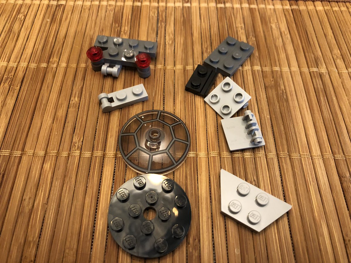 A few sloped blocks finish the chassis, then we build the front canopy and cockpit glass, which hinges forward.  #LEGO  