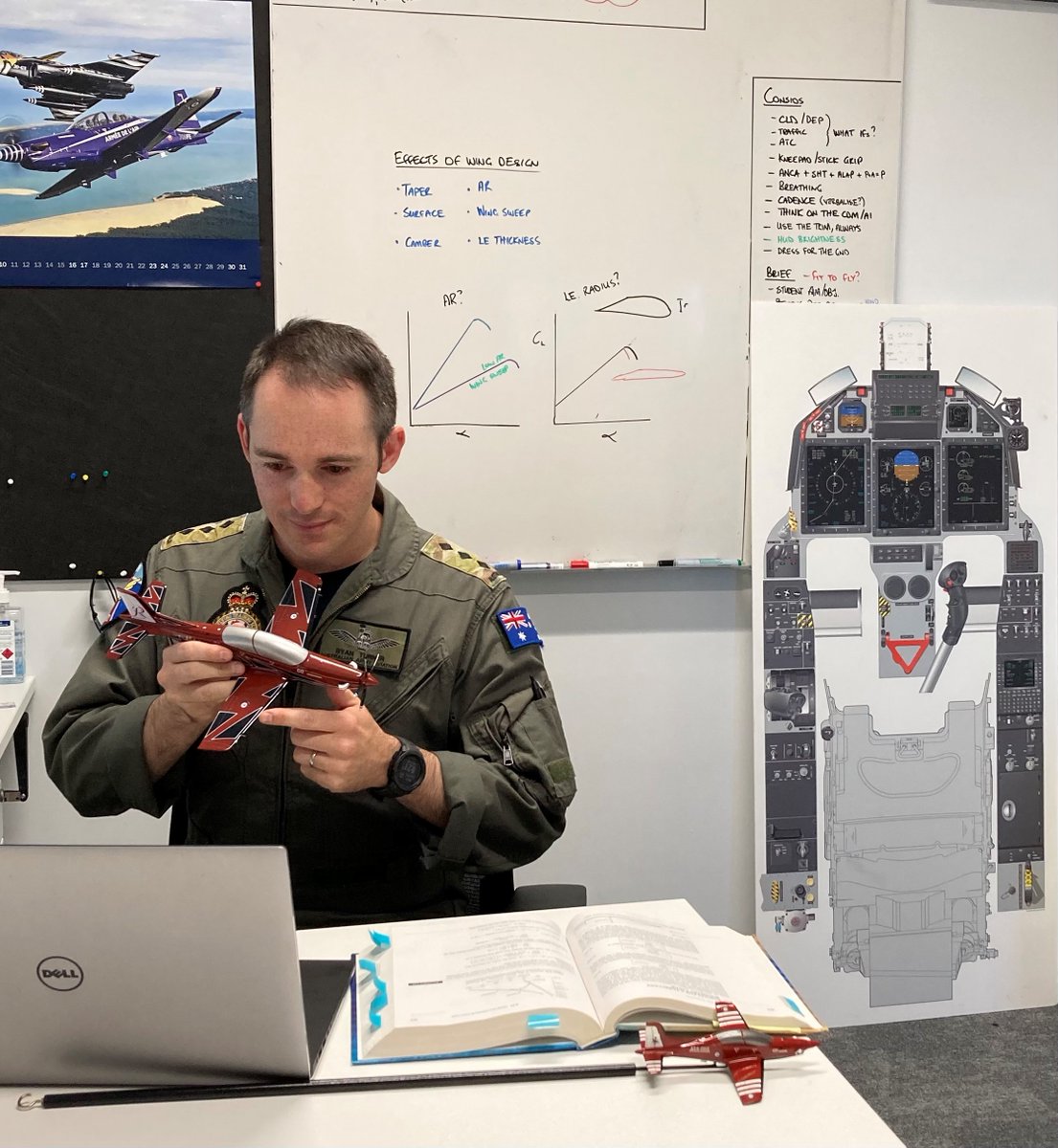 Number 1 Flying Training School Qualified Flying Instructor, Australian Army officer Captain Ryan Turner, delivers a remote course in aerodynamics to pilot trainees in lockdown at RAAF Base East Sale, Victoria.