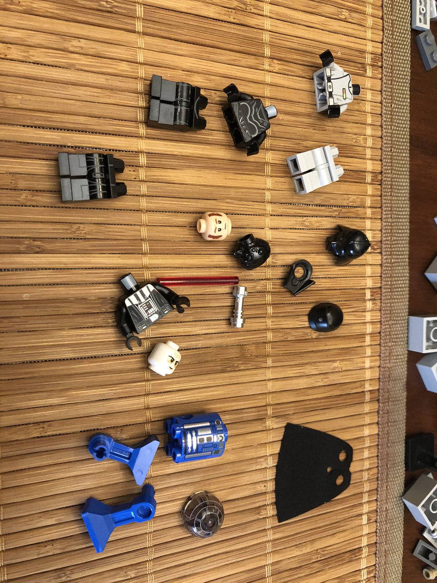 The first section is the bottom floor of the Death Star - and of course starts with some figurines. Death Vader, an officer, a Death Star droid, and an imperial astromech.  #LEGO  