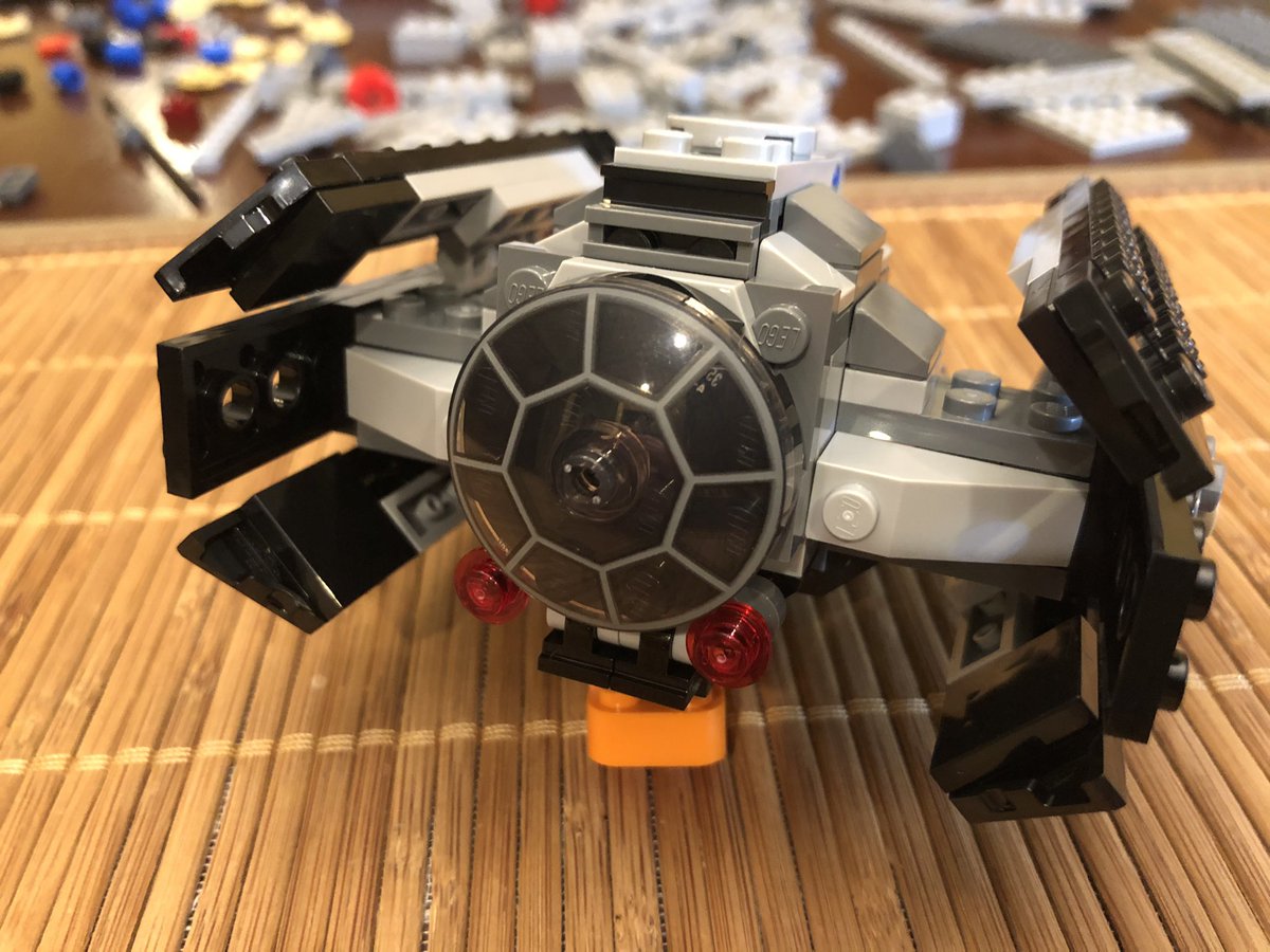 Attach the wings and bend the hinges a bit. Darth Vader has a very snug fit in his fighter! Unlike the larger models, there’s no working weapons on this one.  #LEGO  